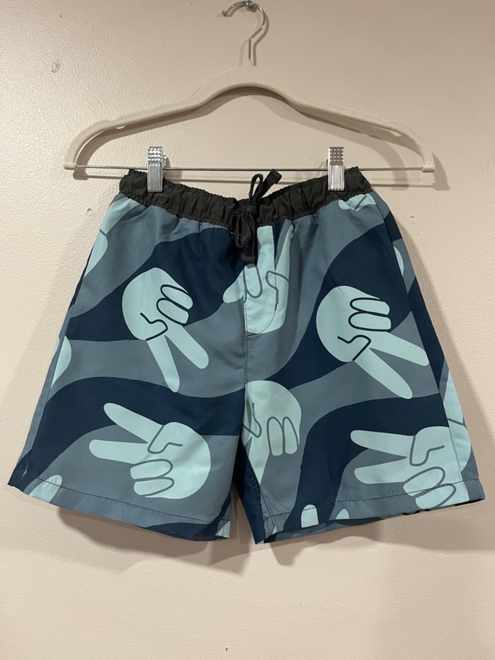 T&B Boys Blue Peace Sign Swim Trunks. Size 8/10